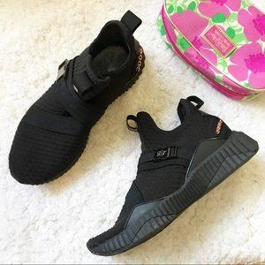 defy mid women's training shoes